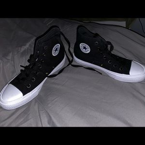 Black and white high top converse